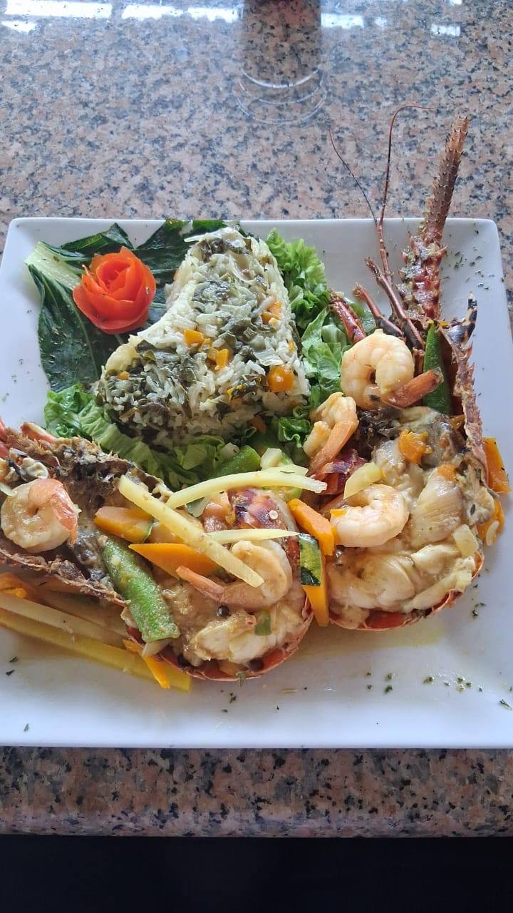 Lobster & Shrimp with Callaloo Rice prepared by Steakaville Rest Stop